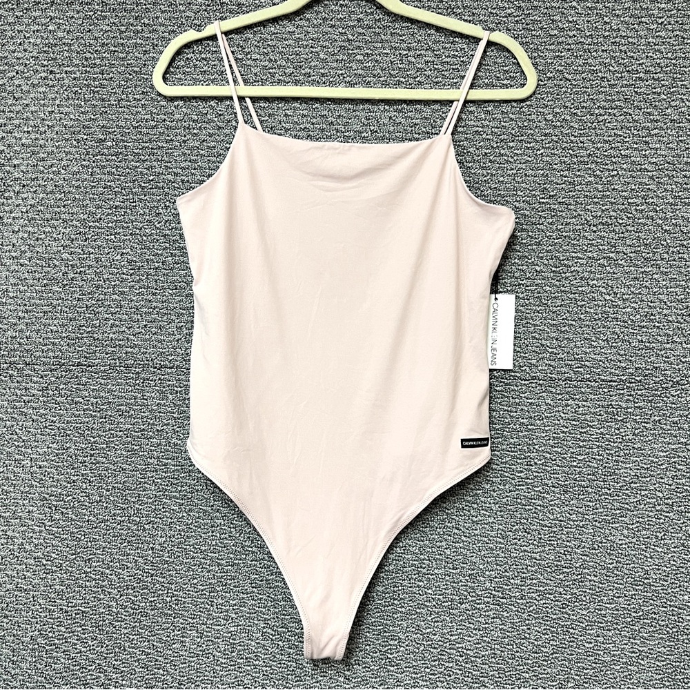 Calvin Klein Jeans women’s pale pink bodysuit size M NWT